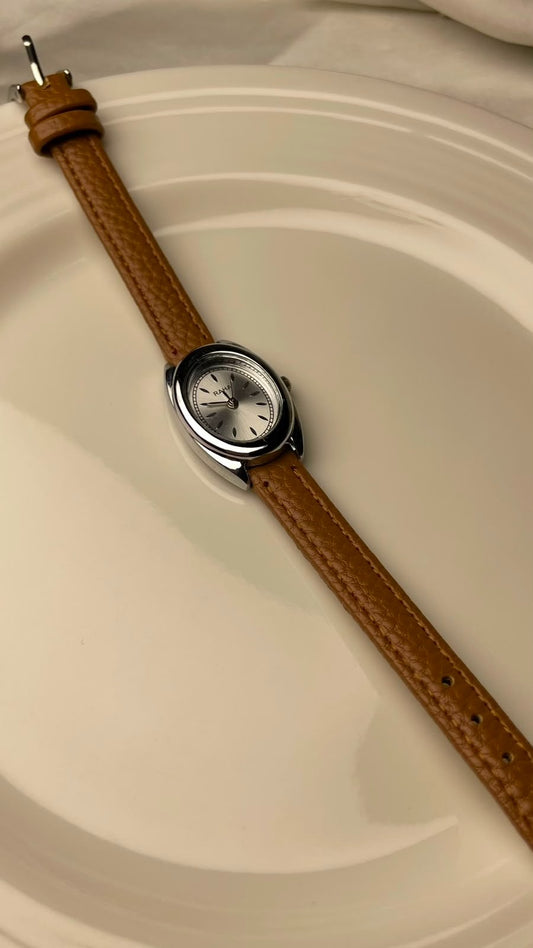 Minimalist Oval Case Quartz Watch – Polished Silver / Light Brown Textured Band